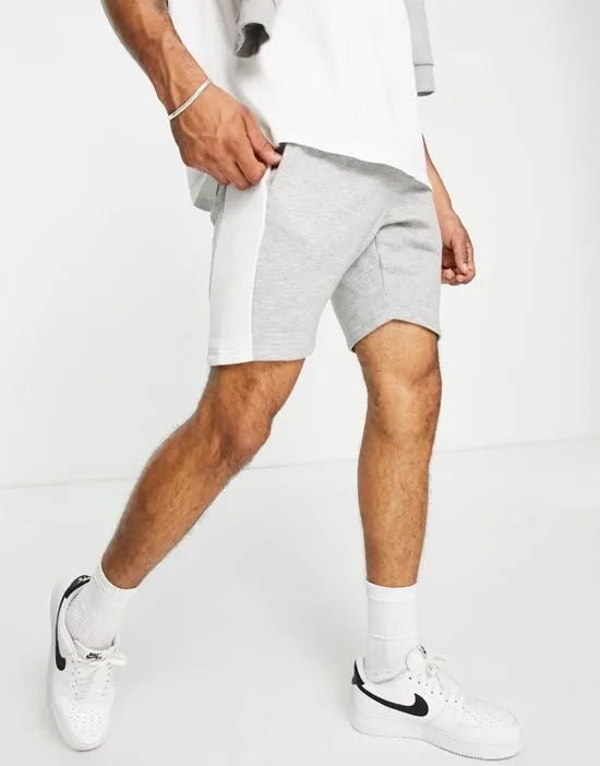 https://images.styletyx.com/images/panel-jersey-shorts-in-light-gray-le-breve-13286138_1.webp
