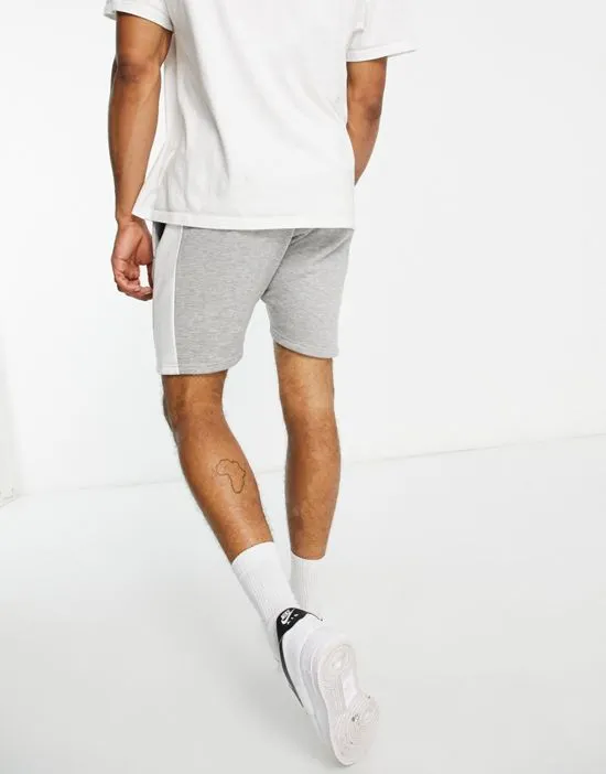 https://images.styletyx.com/images/panel-jersey-shorts-in-light-gray-le-breve-13286138_2.webp