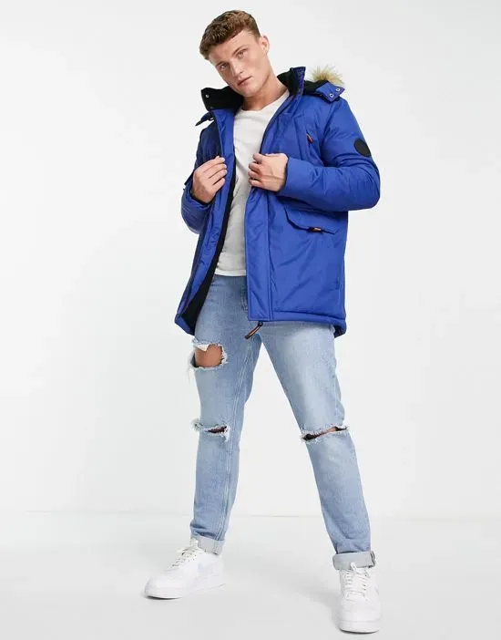 https://images.styletyx.com/images/parka-jacket-with-faux-fur-hood-in-blue-soul-star-13001340_3.webp
