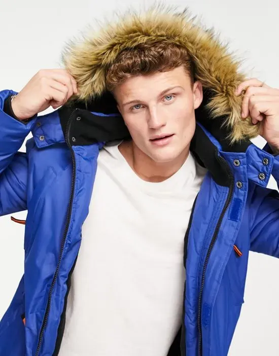 https://images.styletyx.com/images/parka-jacket-with-faux-fur-hood-in-blue-soul-star-13001340_4.webp