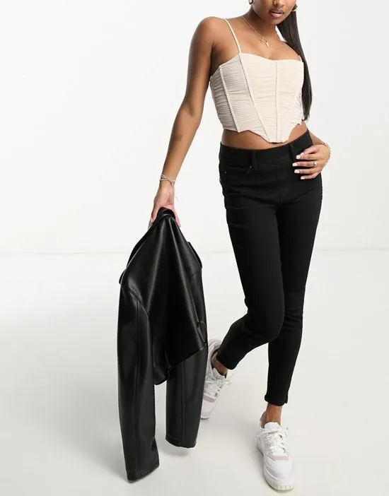 https://images.styletyx.com/images/petite-ankle-skinny-jeans-in-black-spanx-873342831_4.webp