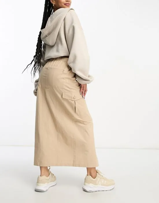 https://images.styletyx.com/images/petite-cargo-pocket-maxi-skirt-in-tan-miss-selfridge-13337239_4.webp