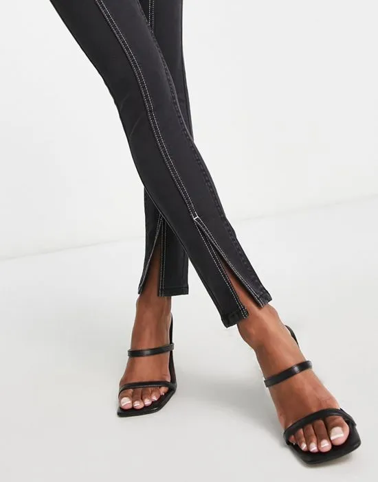https://images.styletyx.com/images/petite-contrast-stitch-split-hem-skinny-jean-in-black-miss-selfridge-3047546_4.webp