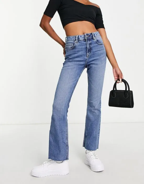 https://images.styletyx.com/images/petite-flare-jean-in-mid-wash-miss-selfridge-3309277_4.webp