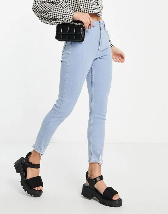 https://images.styletyx.com/images/petite-lizzie-skinny-jeans-with-fray-hem-in-lightwash-blue-miss-selfridge-1783573_4.webp