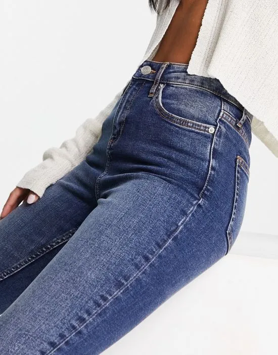 https://images.styletyx.com/images/petite-skinny-jeans-in-mid-wash-miss-selfridge-13250523_3.webp