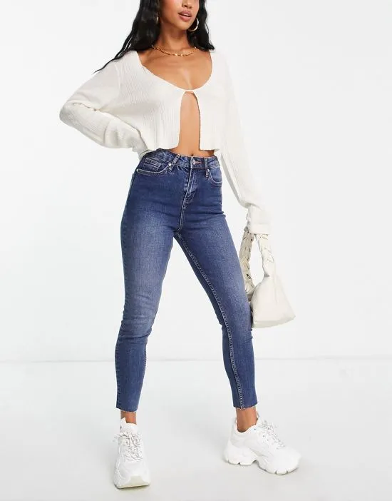https://images.styletyx.com/images/petite-skinny-jeans-in-mid-wash-miss-selfridge-13250523_4.webp