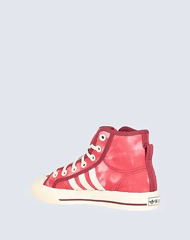 https://images.styletyx.com/images/pink-plain-weave-sneakers-nizza-hi-rf-adidas-3304629_3.webp