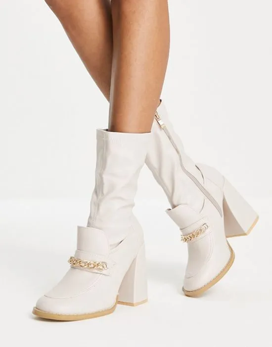 https://images.styletyx.com/images/piper-slim-block-heel-loafer-boots-in-cream-koi-footwear-1929722_2.webp