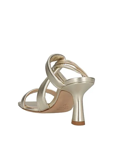 https://images.styletyx.com/images/platinum-leather-sandals-lella-baldi-3201479_3.webp