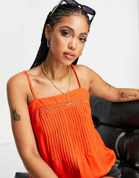 https://images.styletyx.com/images/pleated-front-cami-top-in-bright-orange-part-of-a-set-y-a-s-1891507_3.webp