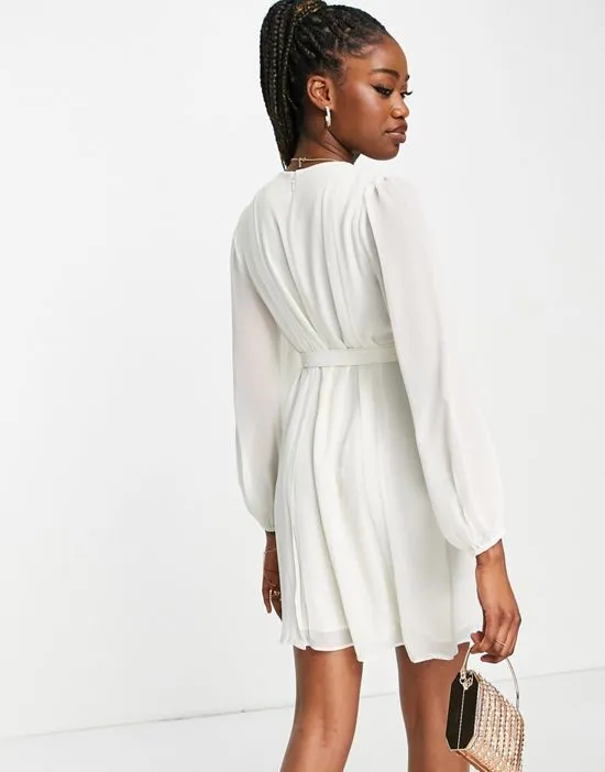 https://images.styletyx.com/images/pleated-tie-waist-mini-dress-in-ivory-ever-new-1825766_2.webp