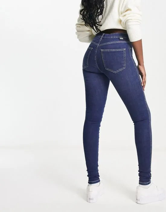 https://images.styletyx.com/images/plenty-skinny-jeans-in-dark-wash-blue-dr-denim-12998881_5.webp
