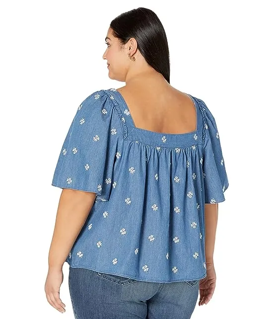 https://images.styletyx.com/images/plus-size-maren-top-in-embroidered-chambray-draper-james-3179335_2.webp