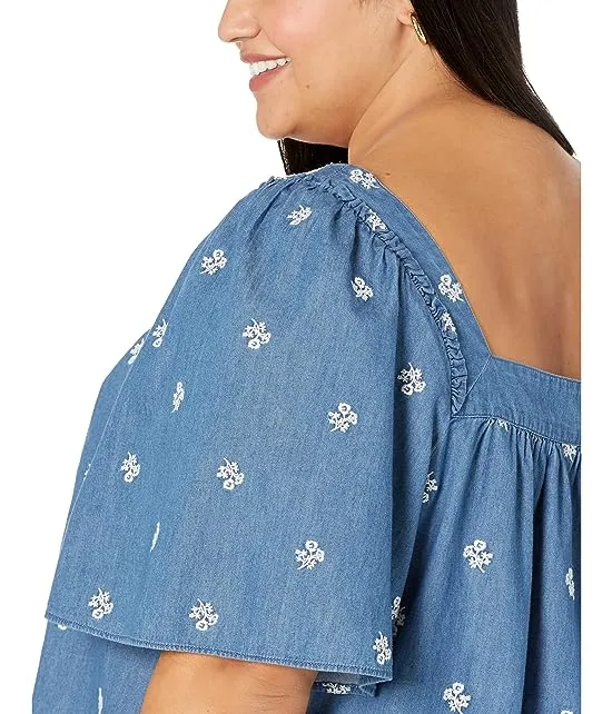 https://images.styletyx.com/images/plus-size-maren-top-in-embroidered-chambray-draper-james-3179335_3.webp