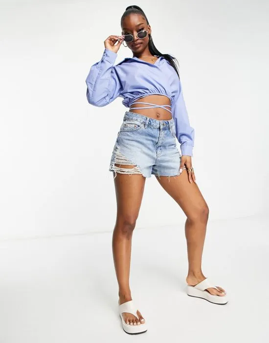 https://images.styletyx.com/images/poplin-wrap-around-waist-shirt-in-blue-missguided-1885412_1.webp