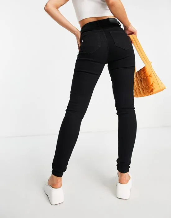 https://images.styletyx.com/images/premium-callie-high-waist-skinny-jeans-in-black-noisy-may-3108201_2.webp