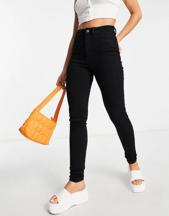 https://images.styletyx.com/images/premium-callie-high-waist-skinny-jeans-in-black-noisy-may-3108201_4.webp