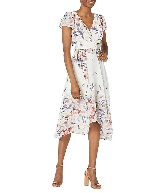 https://images.styletyx.com/images/printed-flutter-sleeve-faux-wrap-midi-dress-dkny-227854665_1.webp