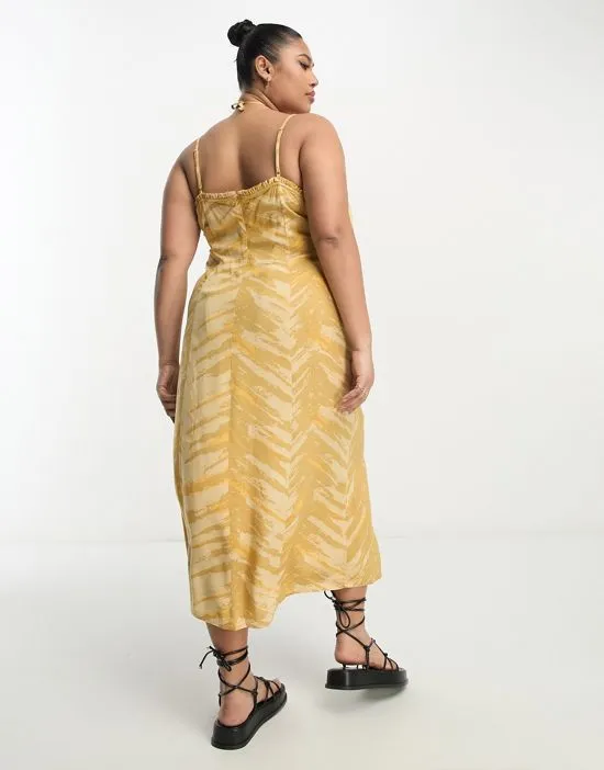 https://images.styletyx.com/images/printed-strappy-midi-dress-in-mustard-only-curve-13276670_2.webp