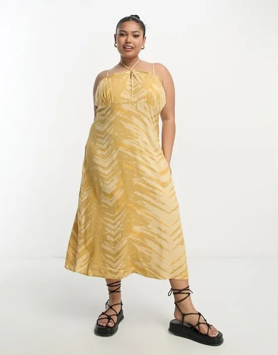 https://images.styletyx.com/images/printed-strappy-midi-dress-in-mustard-only-curve-13276670_4.webp