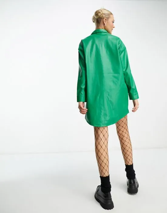 https://images.styletyx.com/images/pu-mini-shirt-dress-in-green-with-contrast-stitch-native-youth-3301234_2.webp
