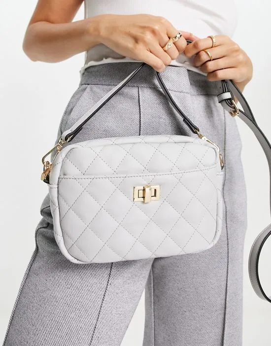 https://images.styletyx.com/images/quilted-shoulder-bag-in-gray-truffle-collection-2833183_4.webp