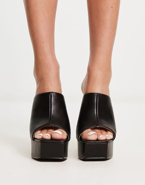 https://images.styletyx.com/images/raid-jovelyn-platform-heeled-mules-in-black-raid-13250504_4.webp