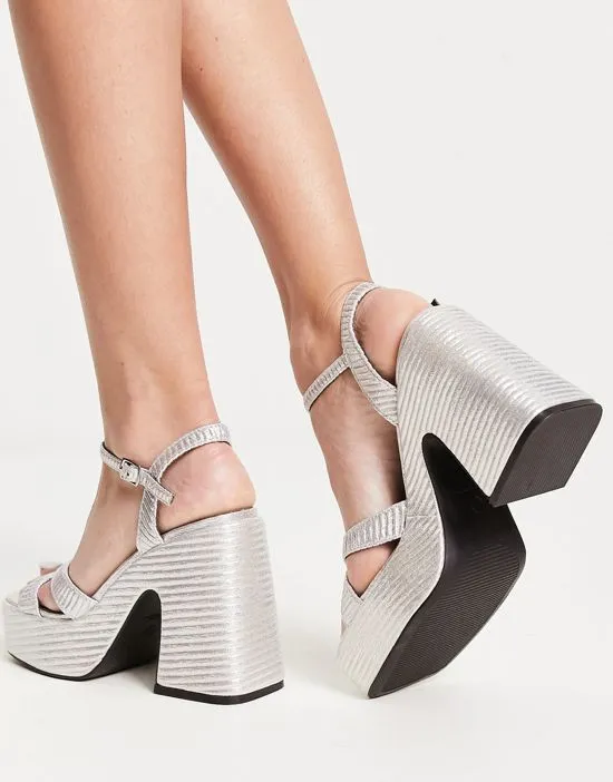 https://images.styletyx.com/images/raid-keiran-platform-sandals-in-textured-silver-metaliic-raid-7872339_3.webp