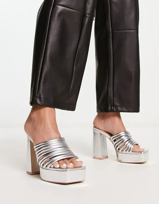 https://images.styletyx.com/images/raid-stella-platform-mules-in-metallic-silver-raid-13250500_2.webp