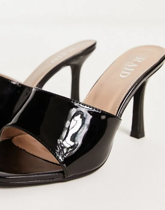 https://images.styletyx.com/images/raid-wide-fit-briya-heeled-mules-in-black-patent-raid-wide-fit-13169909_4.webp