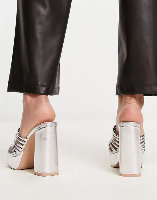 https://images.styletyx.com/images/raid-wide-fit-stella-platform-mules-in-metallic-silver-raid-wide-fit-13250520_2.webp