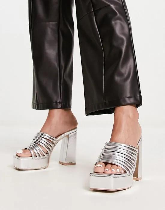 https://images.styletyx.com/images/raid-wide-fit-stella-platform-mules-in-metallic-silver-raid-wide-fit-13250520_4.webp