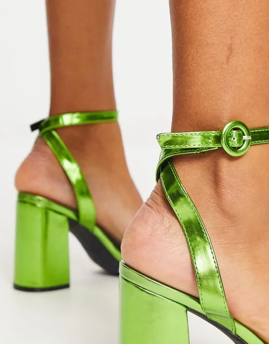 https://images.styletyx.com/images/raid-wide-fit-wink-block-heel-sandals-in-green-metallic-exclusive-to-asos-raid-wide-fit-13000862_4.webp