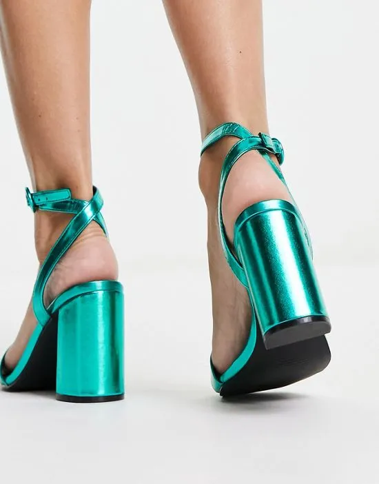 https://images.styletyx.com/images/raid-wide-fit-wink-block-heel-sandals-in-teal-metallic-raid-wide-fit-13095909_2.webp