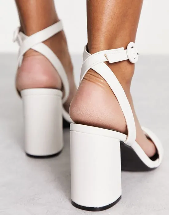 https://images.styletyx.com/images/raid-wide-fit-wink-square-toe-block-heeled-sandals-in-white-raid-wide-fit-13060625_2.webp
