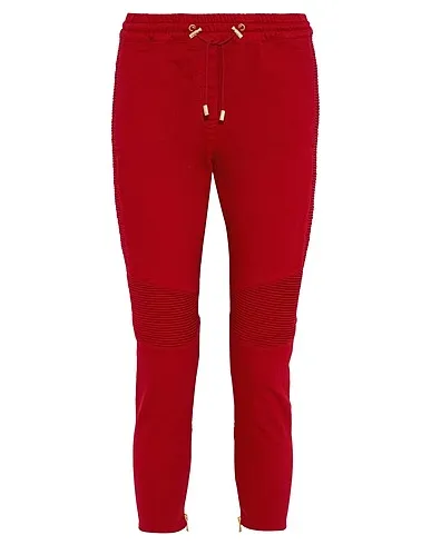 https://images.styletyx.com/images/red-gabardine-casual-pants-balmain-3298068_1.webp