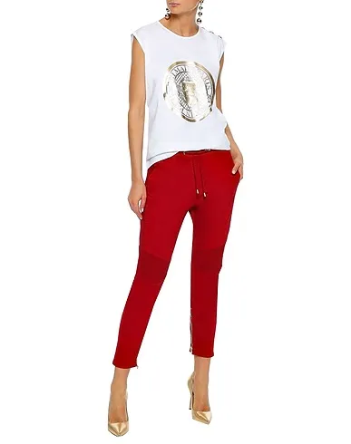 https://images.styletyx.com/images/red-gabardine-casual-pants-balmain-3298068_2.webp