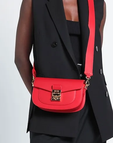 https://images.styletyx.com/images/red-leather-cross-body-bags-mcm-1047865832_3.webp