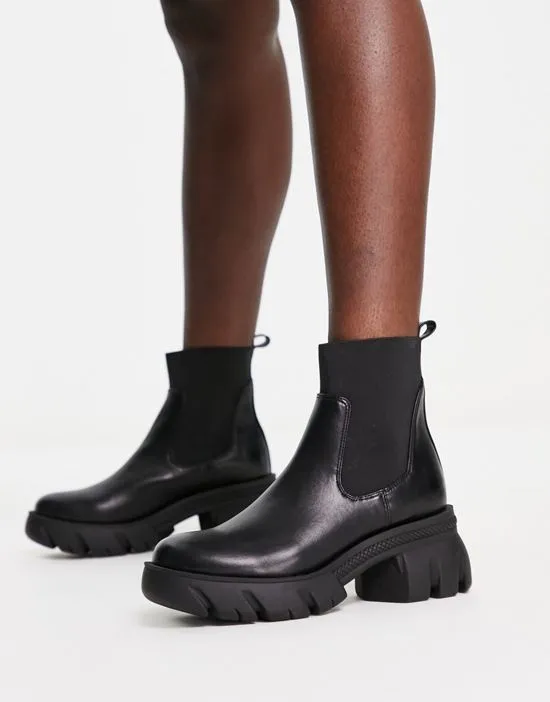 https://images.styletyx.com/images/reed-chunky-chelsea-boots-in-black-asos-design-2801103_1.webp