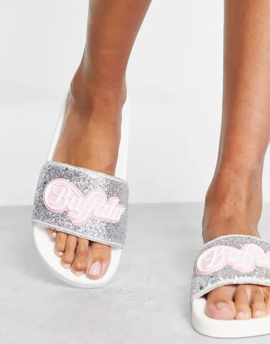 https://images.styletyx.com/images/rees-logo-slides-in-silver-glitter-buffalo-2772822_1.webp