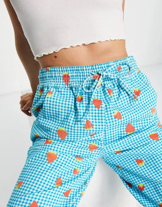 https://images.styletyx.com/images/relaxed-pants-in-strawberry-picnic-print-part-of-a-set-native-youth-2983503_2.webp