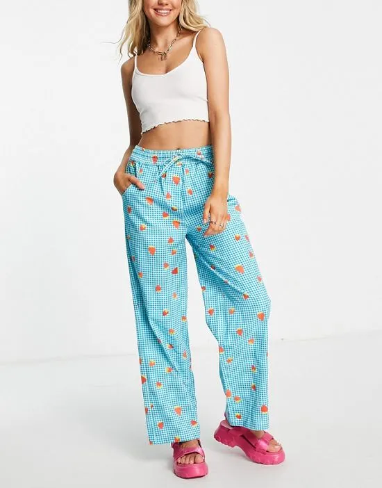 https://images.styletyx.com/images/relaxed-pants-in-strawberry-picnic-print-part-of-a-set-native-youth-2983503_3.webp