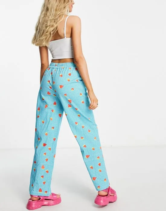 https://images.styletyx.com/images/relaxed-pants-in-strawberry-picnic-print-part-of-a-set-native-youth-2983503_4.webp