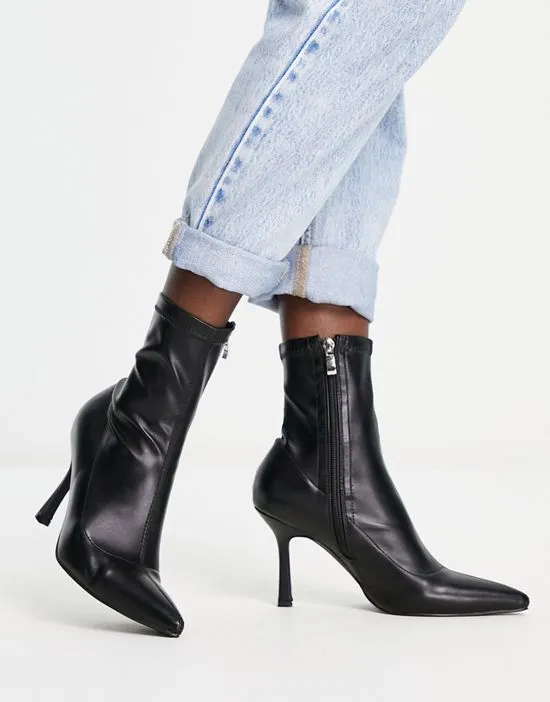 https://images.styletyx.com/images/renata-stiletto-heel-ankle-boots-in-black-raid-2174946_1.webp