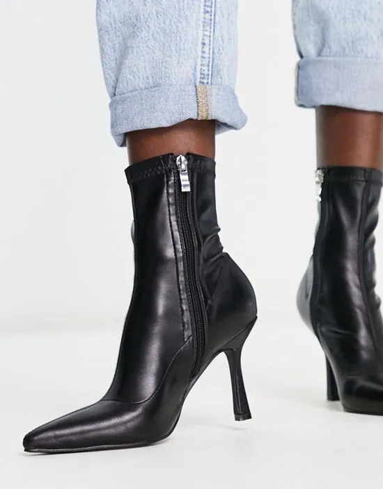 https://images.styletyx.com/images/renata-stiletto-heel-ankle-boots-in-black-raid-2174946_3.webp