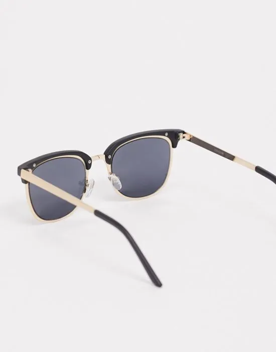 https://images.styletyx.com/images/retro-metal-sunglasses-with-smoke-lens-in-gold-and-black-asos-design-1919513_2.webp