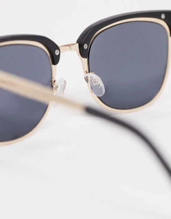 https://images.styletyx.com/images/retro-metal-sunglasses-with-smoke-lens-in-gold-and-black-asos-design-1919513_4.webp