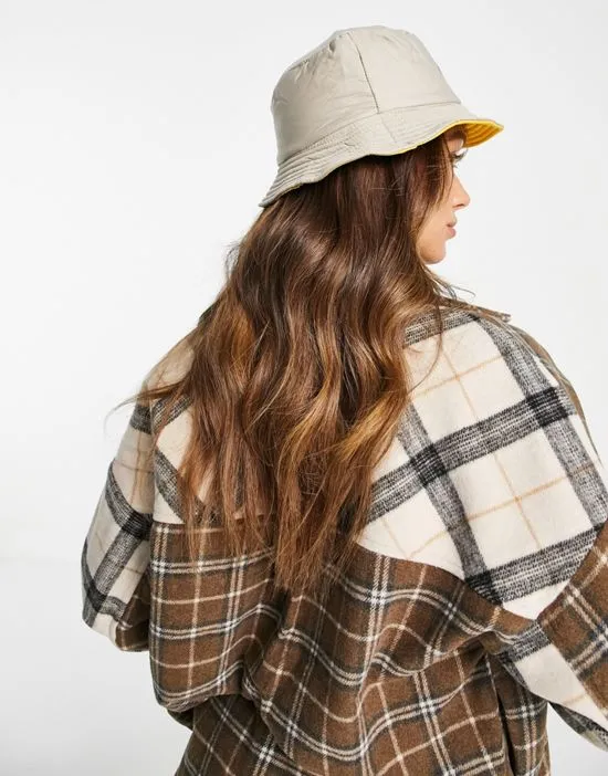 https://images.styletyx.com/images/reversible-nylon-bucket-hat-in-soft-taupe-and-yellow-french-connection-3081990_4.webp