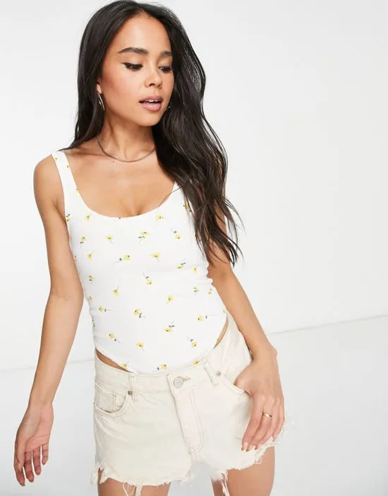 https://images.styletyx.com/images/rib-bodysuit-in-yellow-delicate-floral-asos-design-1891529_1.webp